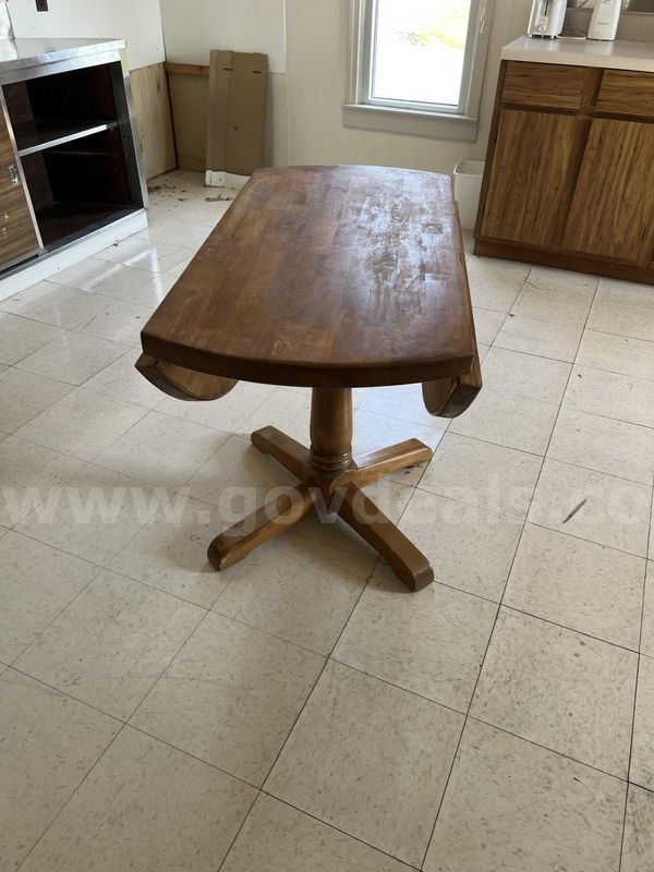 Wooden table with drop leaves