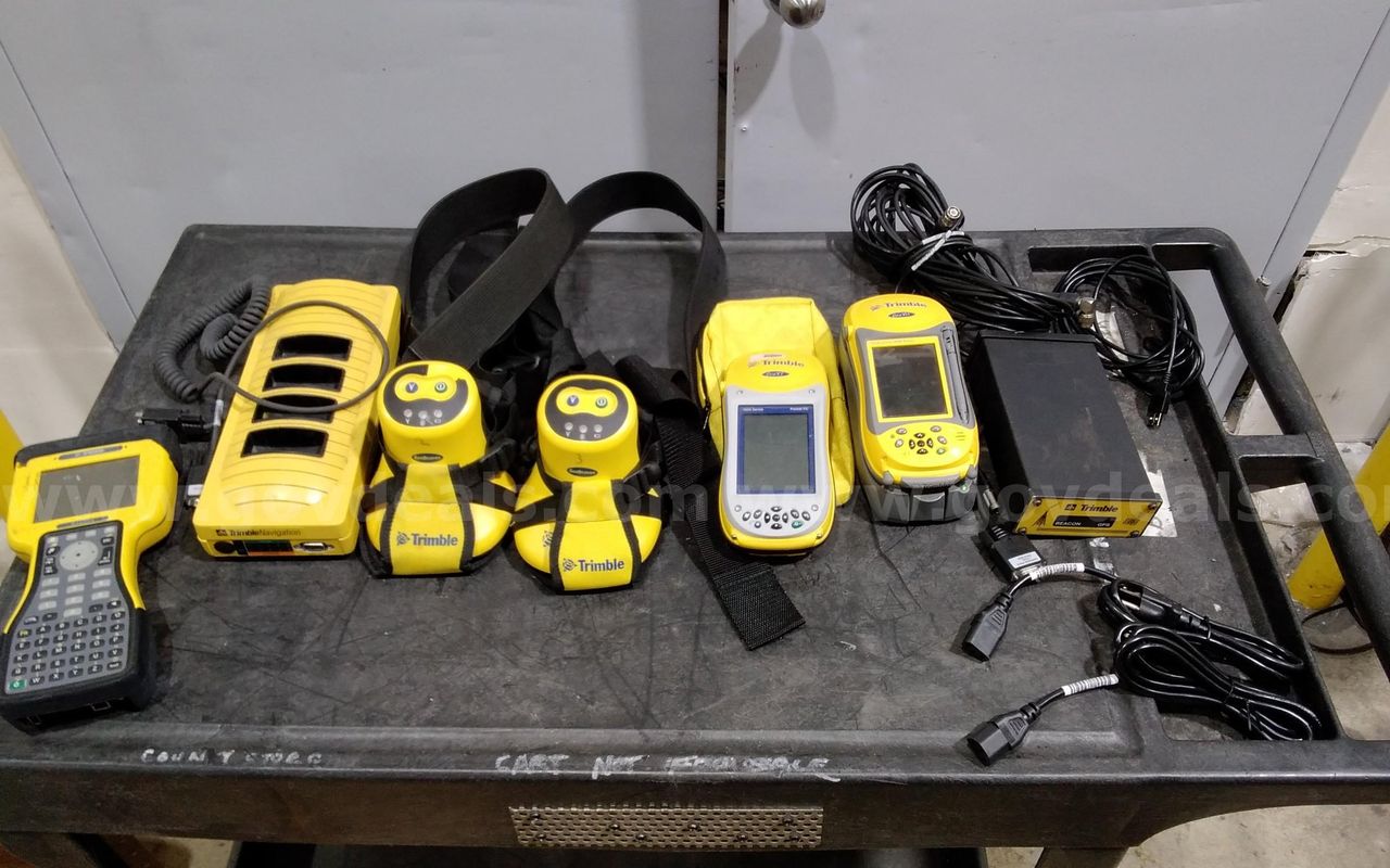 Lot of Trimble survey data collection tools.