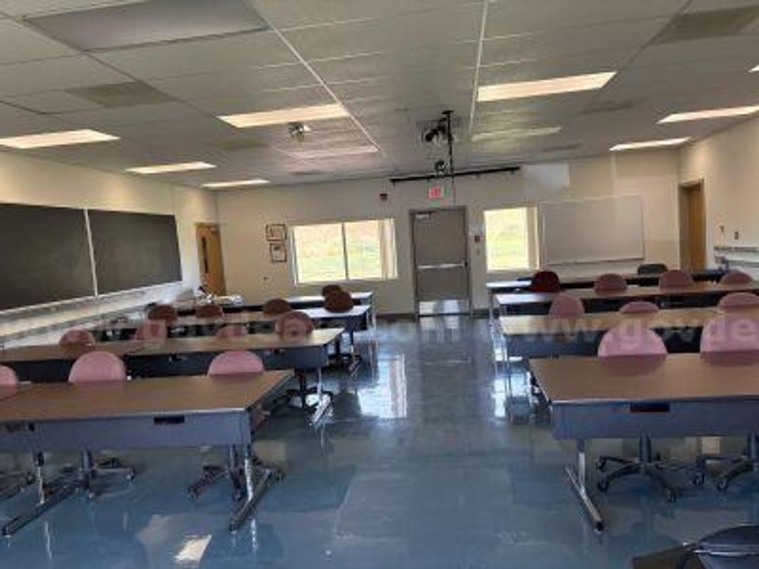 Classroom tables and rolling chairs