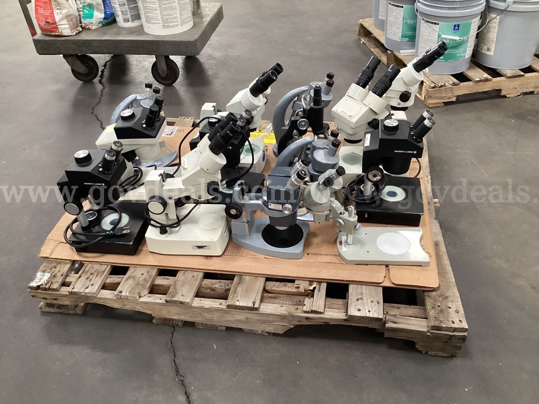 Pallet Containing Various Microscopes .