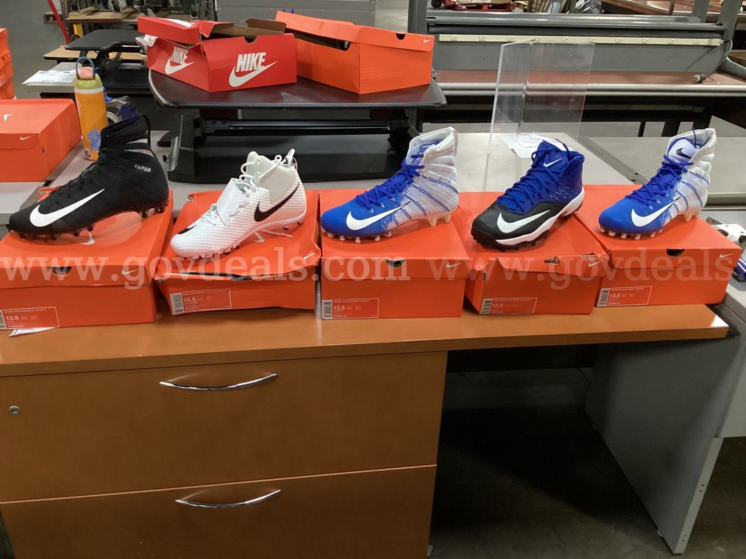 5 - Pairs of Size 13.5 NIKE Cleats.