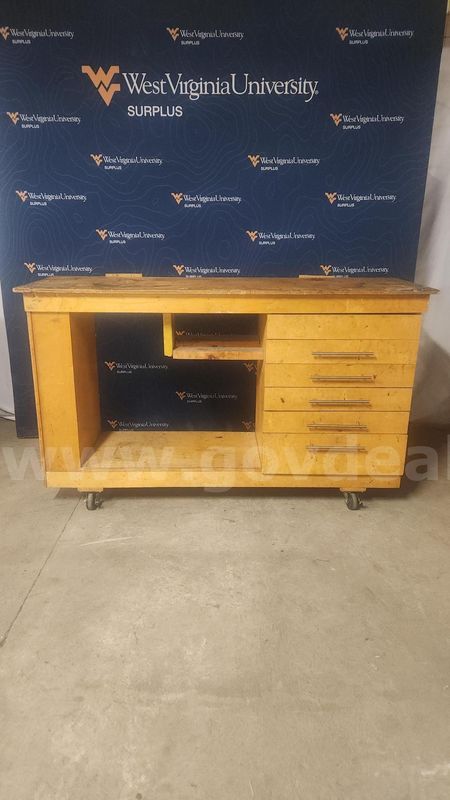 Wooden work bench on wheels. Very sturdy
