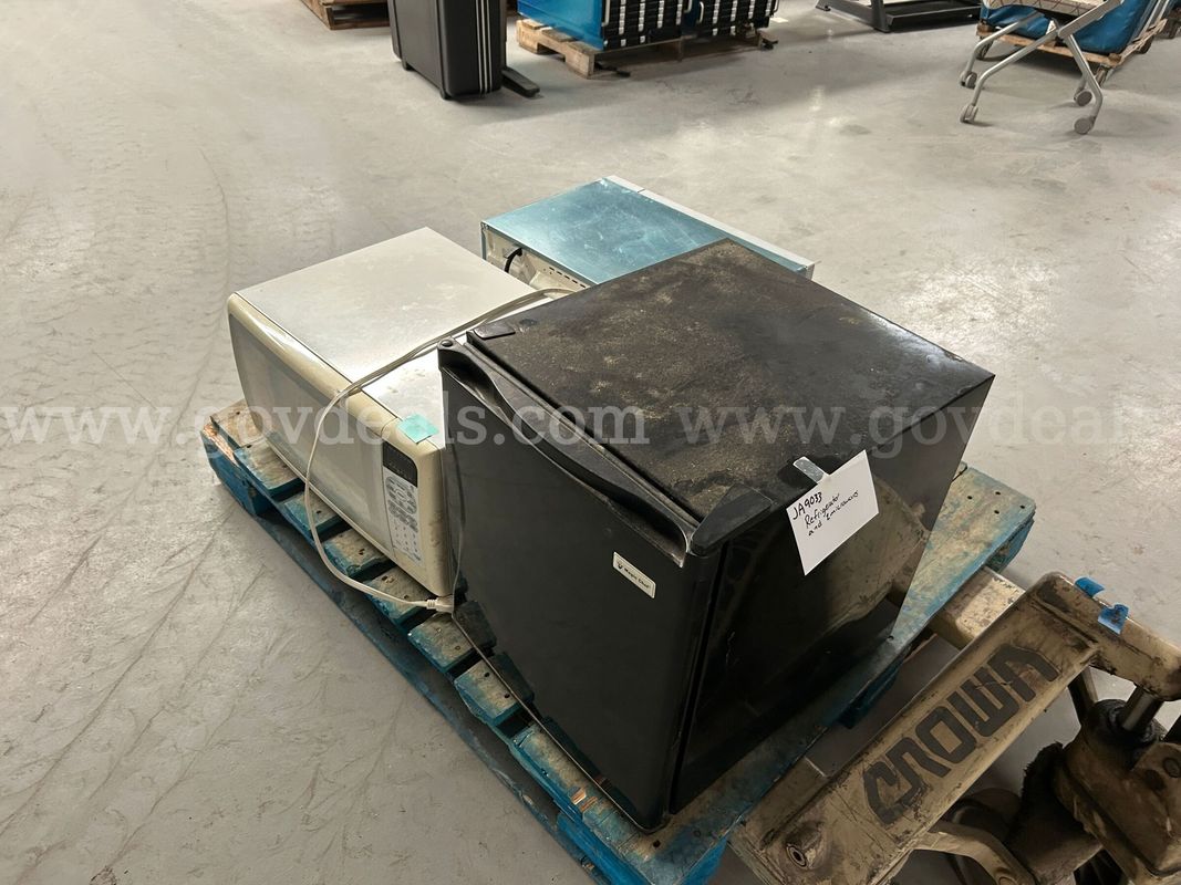 small fridge and 2 microwaves