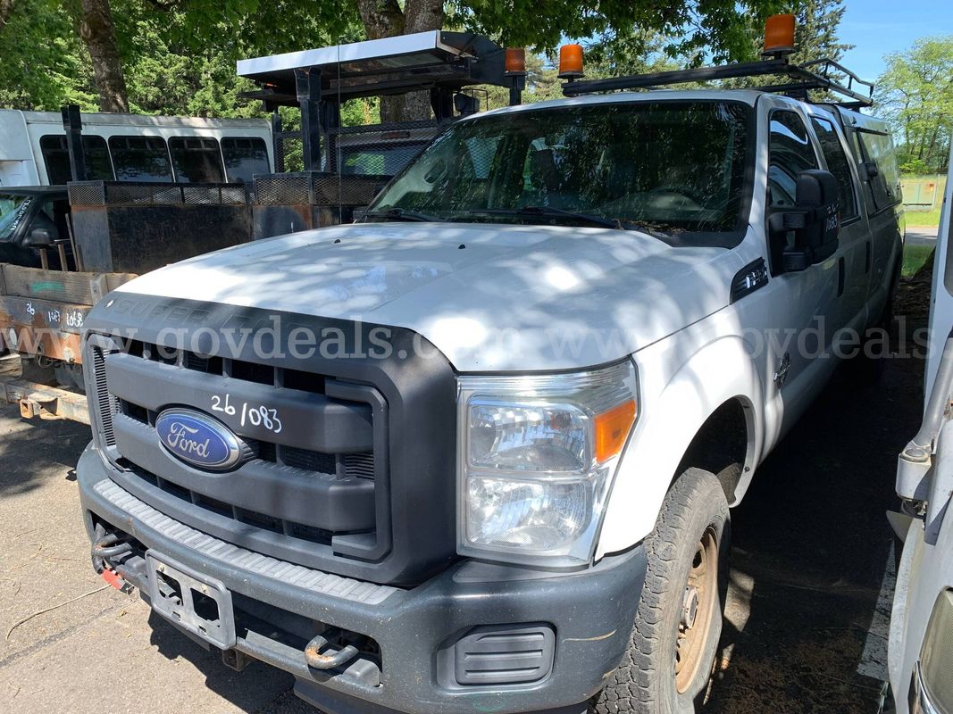 2015 Ford F-250 SD Crew Cab Long Bed 4WD Truck w/ Canopy *Tow-Away* (ID# 46007) (PRT) (26-1083) 405