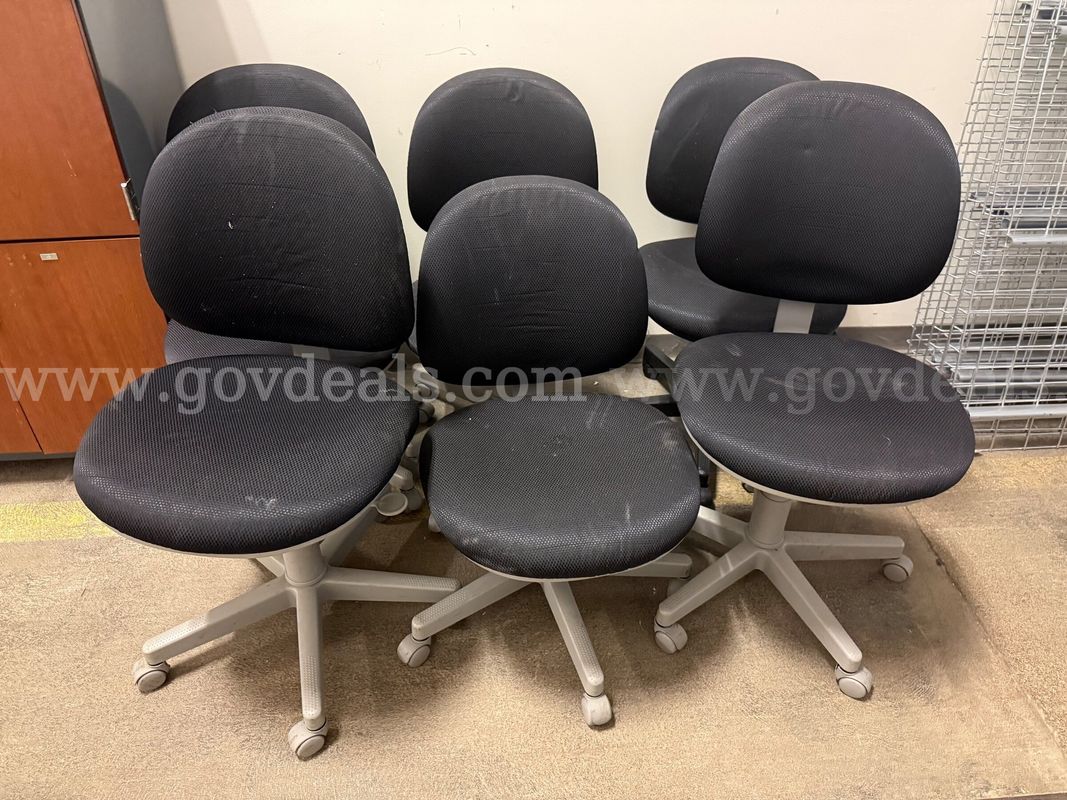 6 Black Cushioned Swivel Chairs with Wheels