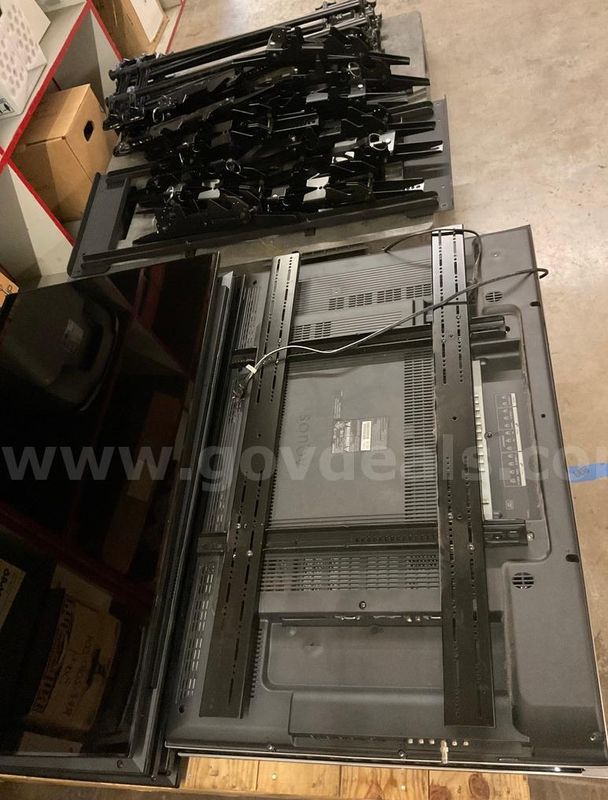 A Lot of Nine Televisions and Components