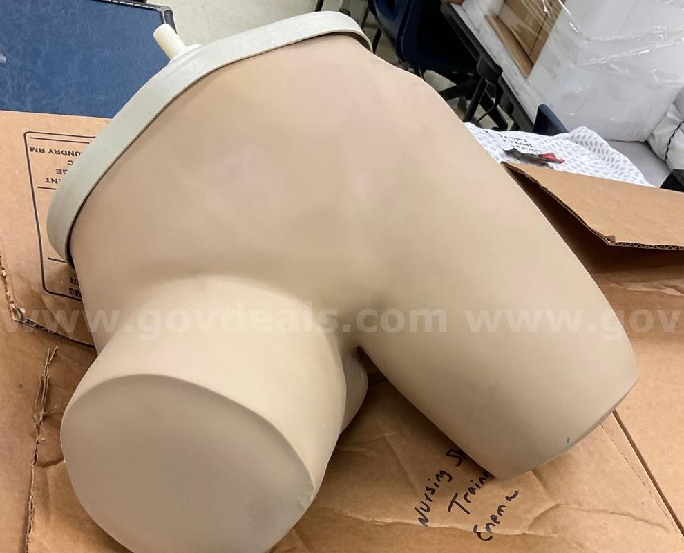 Lot of Two Enema Training Replicas