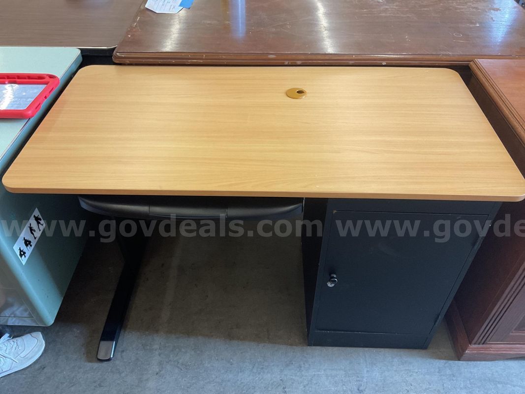 Black desk with wooden top