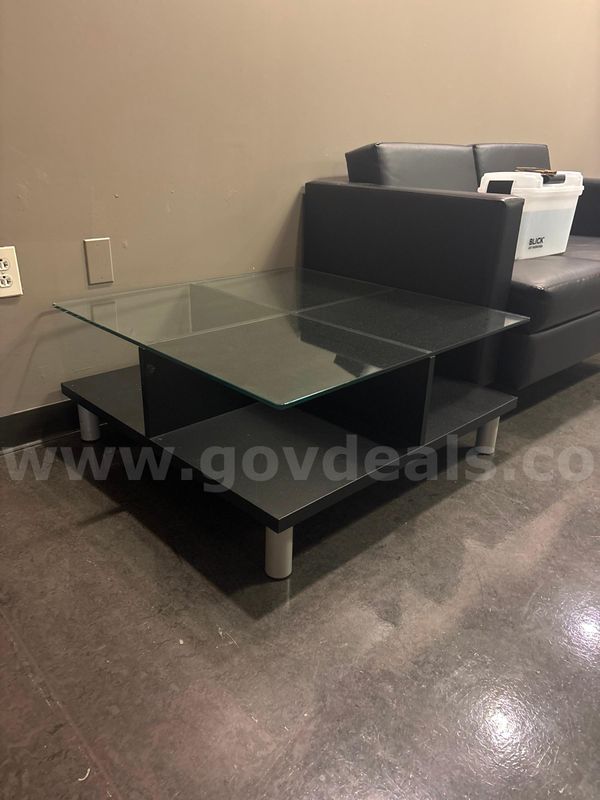 Black glass top coffee table