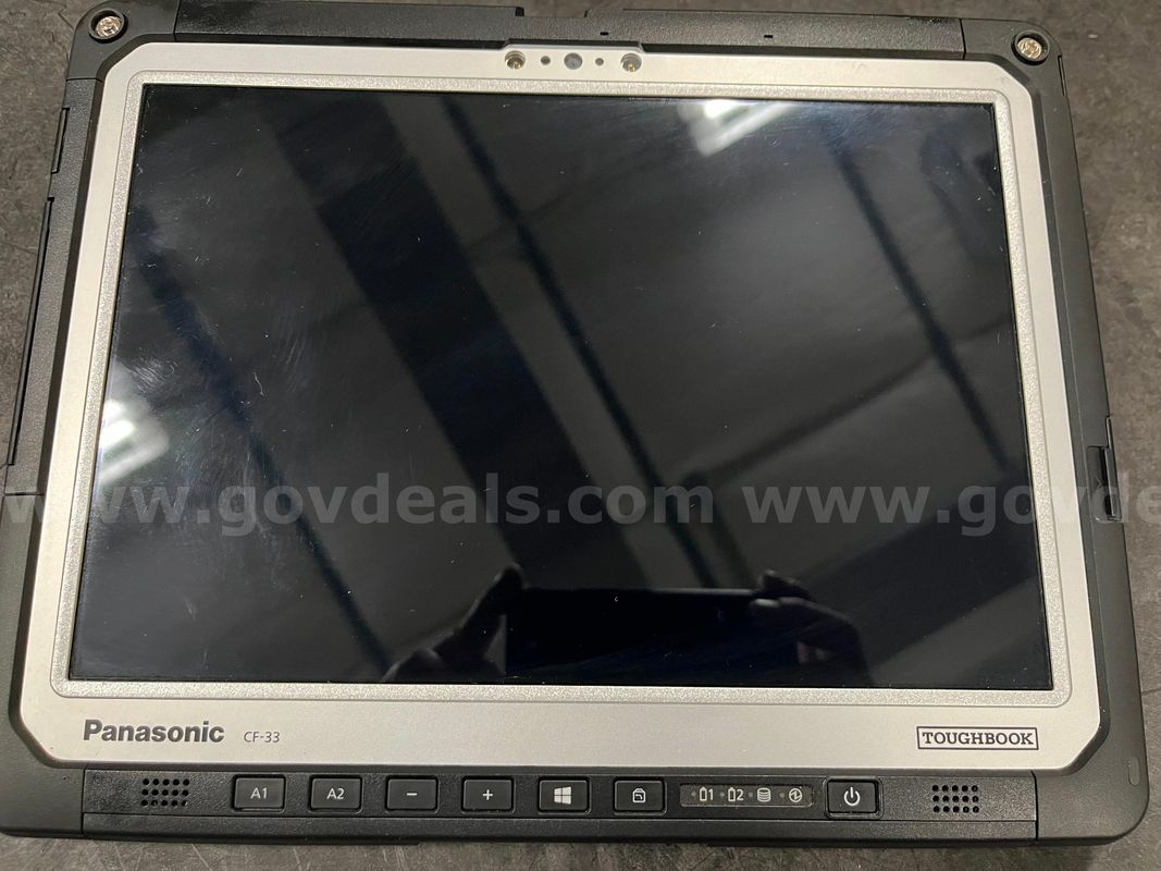 Lot of 5 Panasonic Toughbook CF-33 touchscreen PC's with new in box docks, used keyboards, and used power supplies