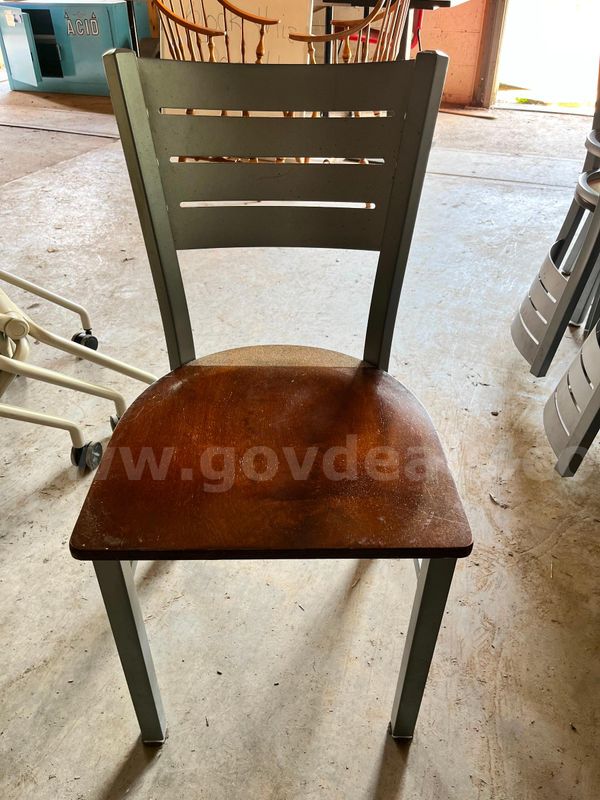 12 chairs, lightweight metal legs and back, wood seat.