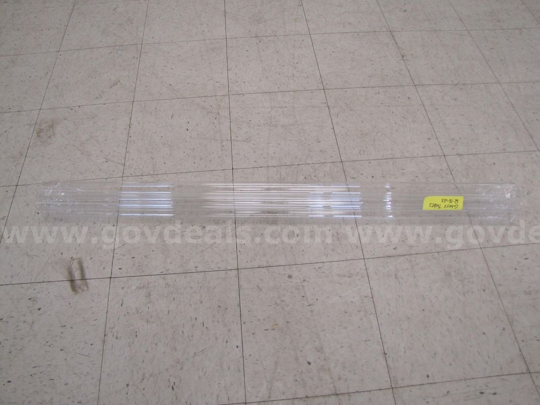Set of 4 glass tubes.